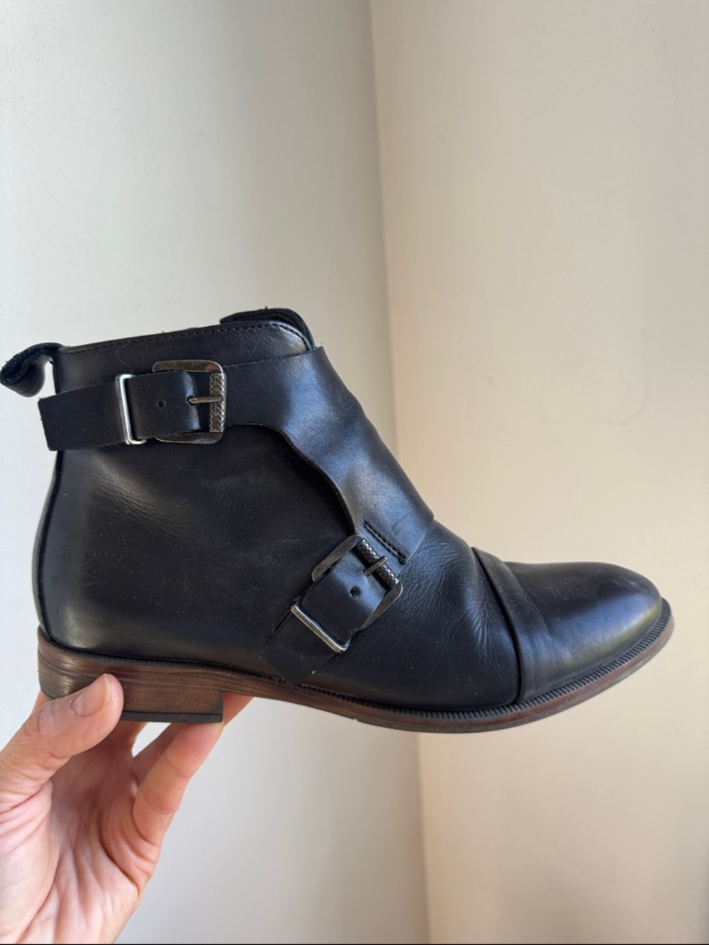 Ateliers Black Leather Ankle Booties with Buckle Accent